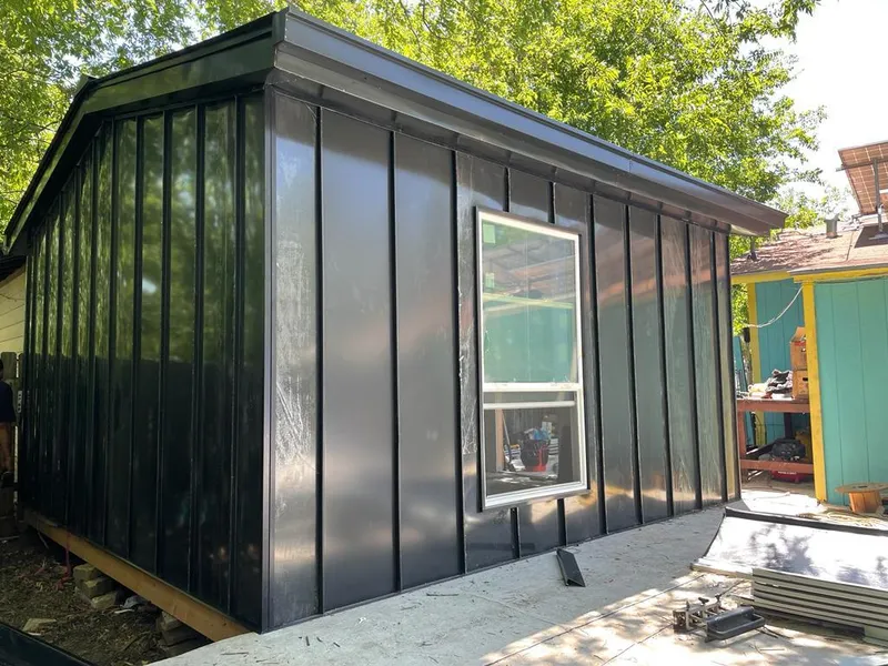 Black standing seam metal wall panels for Roof Inspection in Thornbury